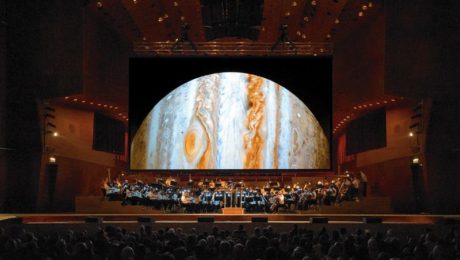 The Chicago Sinfonietta performs against the backdrop of Jose Francisco Salgado's images