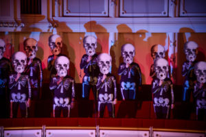 A masked choir performs Mozart's Requiem with the Chicago Sinfonietta at their 2013 Dia de los Muertos concert