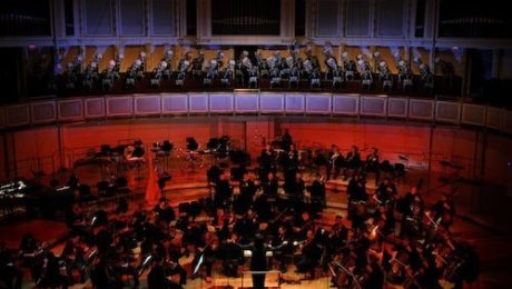 A masked chorus sings Mozart's Requiem alongside the Chicago Sinfonietta