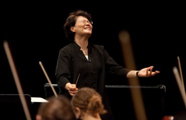 Music director Mei-Ann Chen leads the Chicago Sinfonietta, the choir of Roosevelt University's Chicago College of Performing Arts, and the Anima Young Singers of Greater Chicago in Carl Orff's 'Carmina Burana'